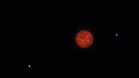 Shrouded Giant at the centre. 4 planets and 12 moons around it.